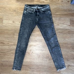 Grey acid wash jeans